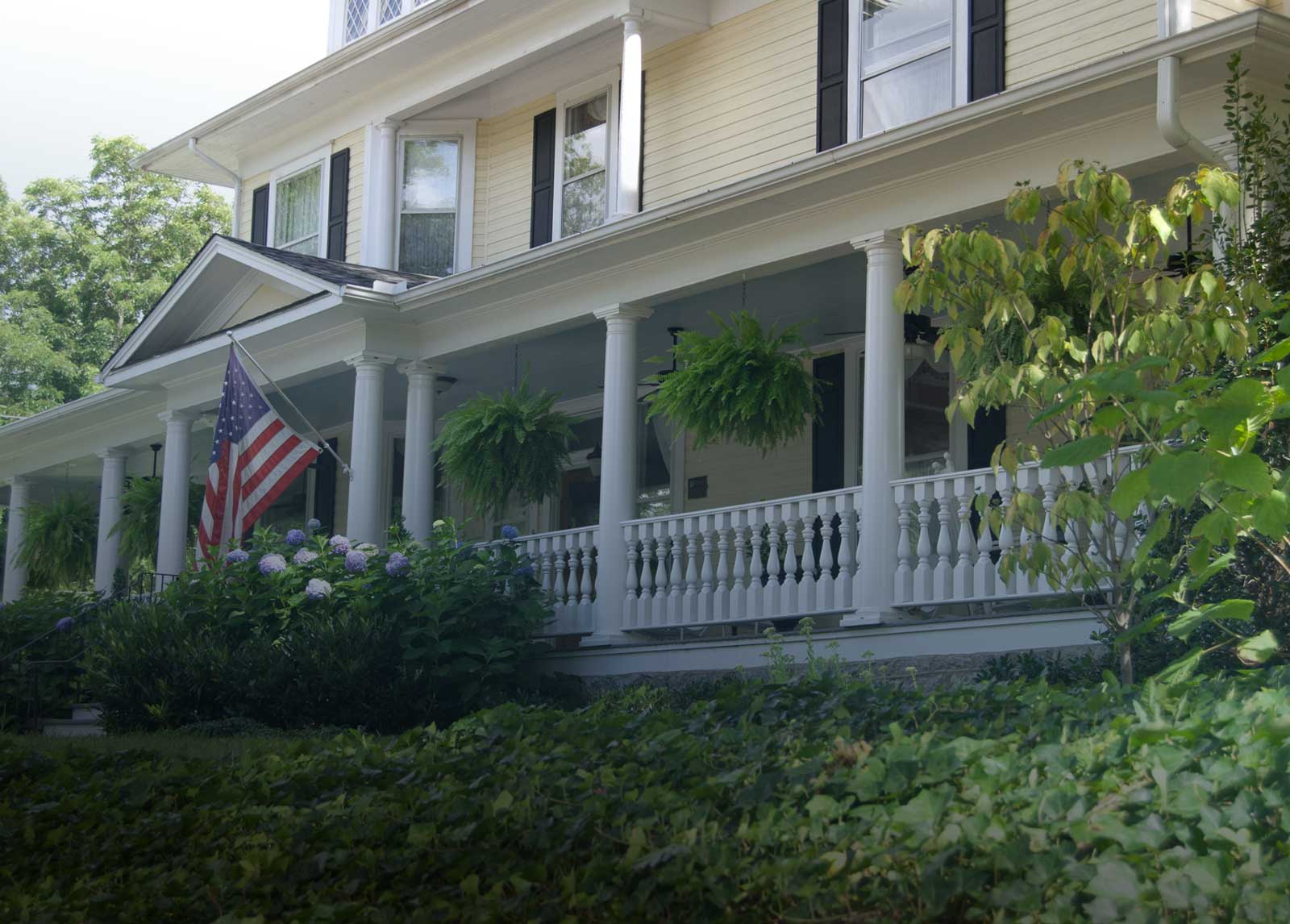 front porch of Elizabeth Leigh Inn bed and breakfast in Hendersonville NC